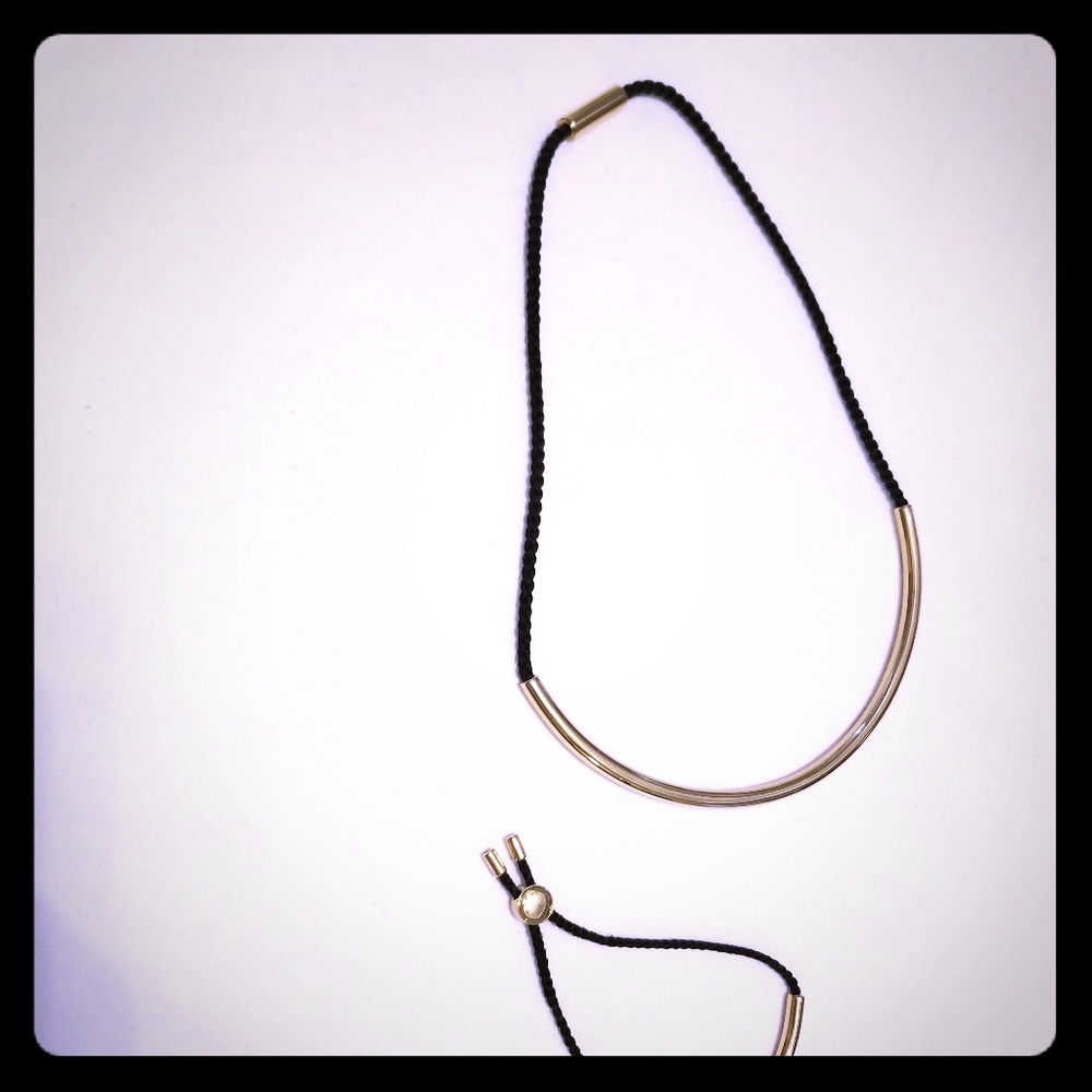 Michael Kors Black and gold necklace and bracelet